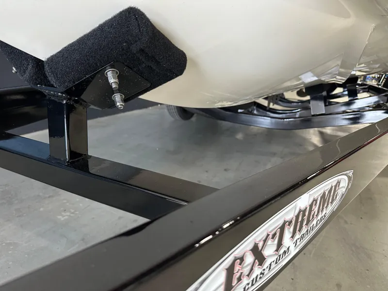 Slide: The Image of 2002 Malibu Sunsetter boat on Extreme Custom Trailers, close-up view of trailer support. - 3