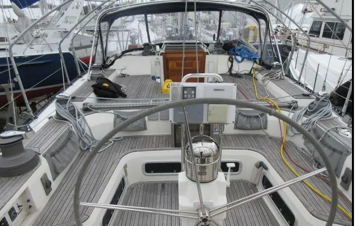 Slide: The Image of Cockpit of 1994 C&C 51 XL C/B sailboat with steering wheel and navigation equipment. - 33