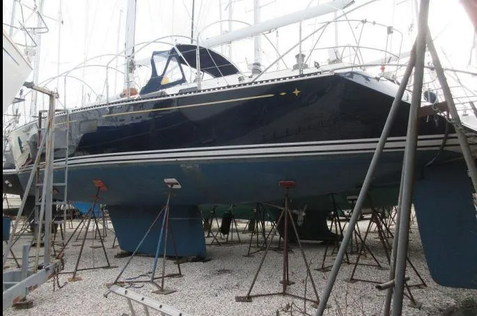 Slide: The Image of Sailboat C&C 51 XL C/B 1994 on stands in a boatyard. - 37