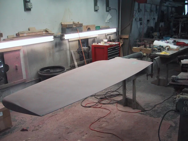 Slide: The Image of Workshop with a C&C 51 XL C/B 1994 boat component under construction. - 44