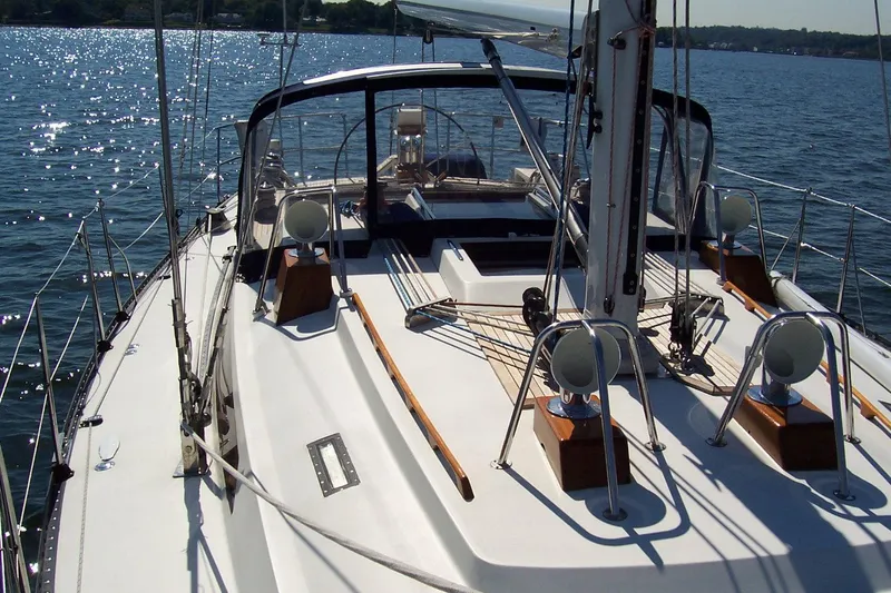 Slide: The Image of Sailing yacht C&C 51 XL C/B, 1994 model, on calm waters under clear skies. - 6