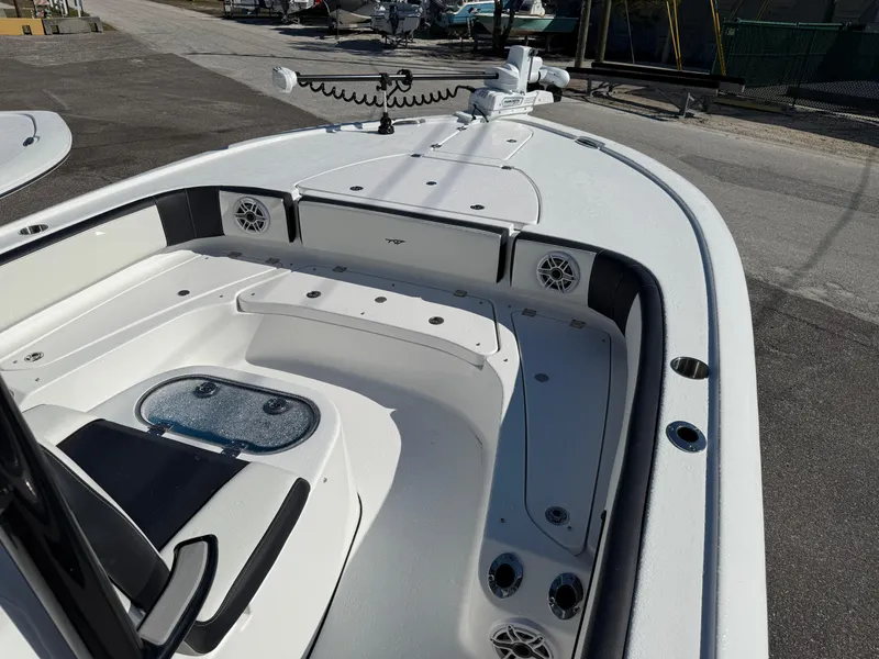Slide: The Image of 2025 Tidewater 2700 Carolina Bay boat interior with seating and storage compartments. - 3