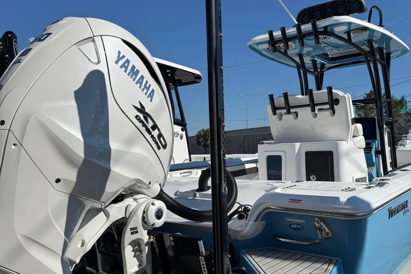 Slide: The Image of 2025 Tidewater 2700 Carolina Bay boat with Yamaha engine, featuring sleek design and modern amenities. - 9