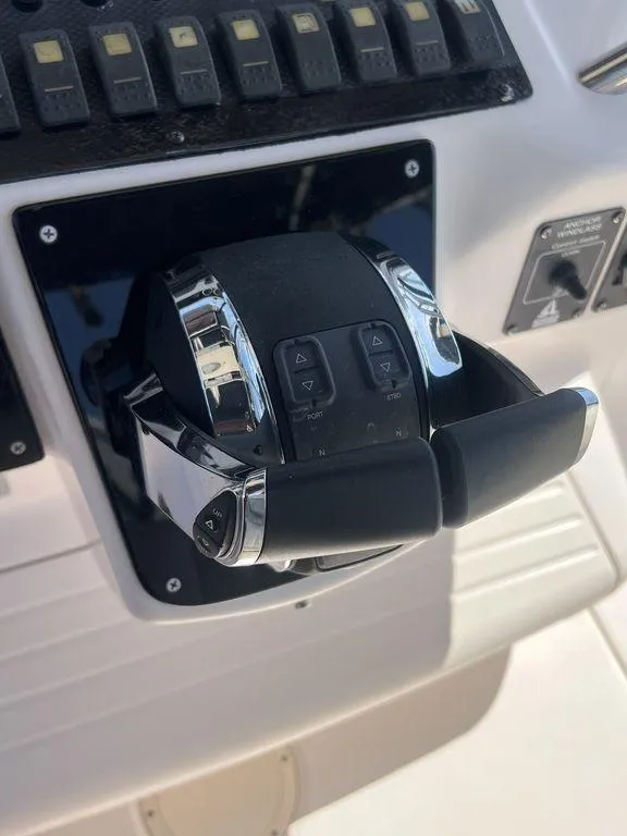 Slide: The Image of Throttle control of a 2003 Grady-White 306 Bimini boat. - 23