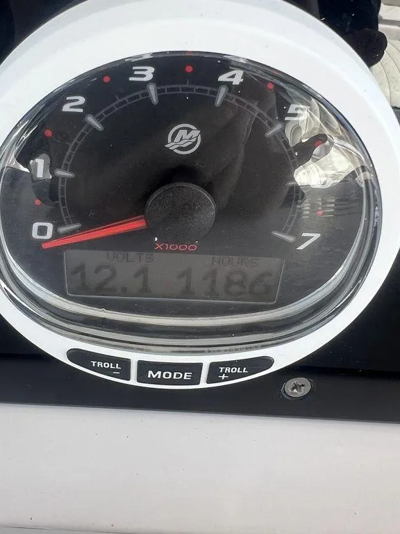 Slide: The Image of Close-up of a Grady-White 306 Bimini 2003 boat tachometer display. - 27