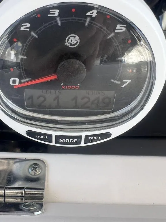 Slide: The Image of Close-up of a Grady-White 306 Bimini 2003 boat tachometer displaying 1249 hours. - 30