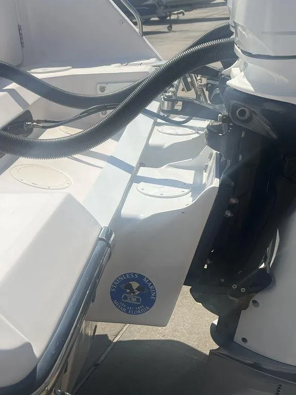 Slide: The Image of 2003 Grady-White 306 Bimini boat engine and stern detail in sunlight. - 7