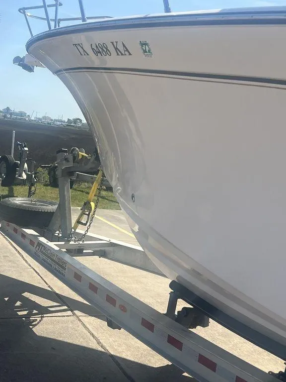 Slide: The Image of 2003 Grady-White 306 Bimini boat on trailer, side view, registration TX 6488 KA. - 9