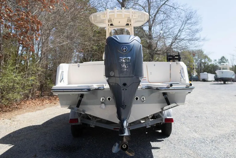 Slide: The Image of 2023 Grady-White Fisherman 236 boat with Yamaha outboard motor, parked outdoors. - 4