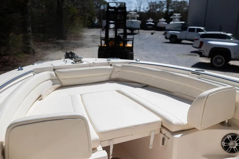 Slide: The Image of 2023 Grady-White Fisherman 236 boat interior with cushioned seating. - 7