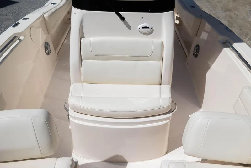 Slide: The Image of 2023 Grady-White Fisherman 236 boat interior with white seating and console. - 9