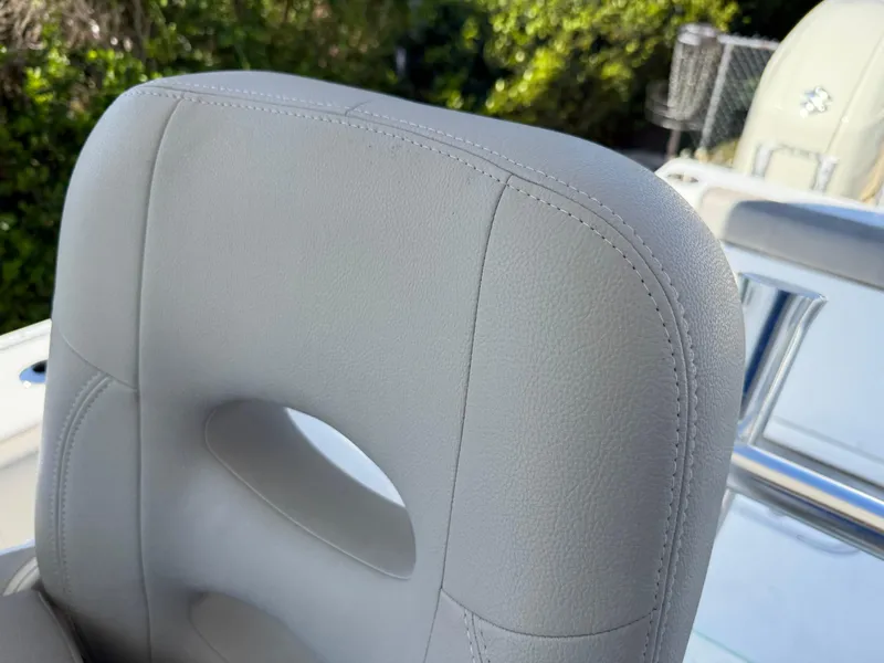 Slide: The Image of 2020 Cape Horn 27 XS boat seat with light gray upholstery. - 30