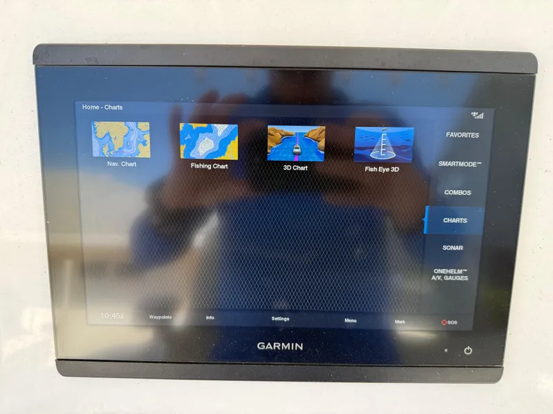 Slide: The Image of Garmin marine display on 2020 Cape Horn 27 XS, showing navigation and fishing charts. - 35