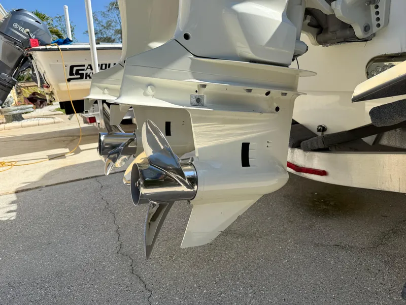 Slide: The Image of 2020 Cape Horn 27 XS boat with dual stainless steel propellers on a trailer. - 13