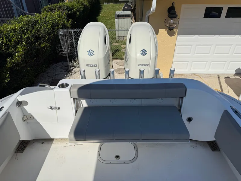 Slide: The Image of 2020 Cape Horn 27 XS boat with dual Suzuki 200 engines and rear seating. - 15