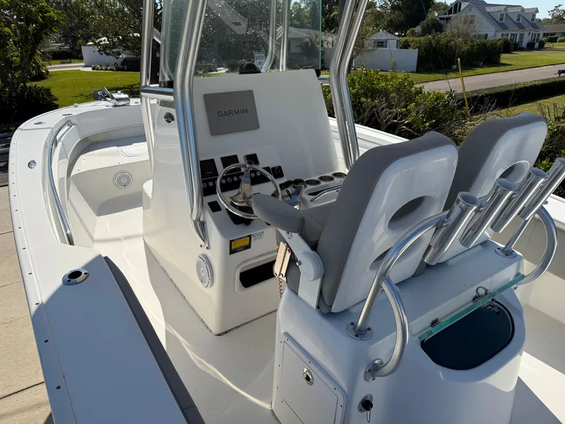 Slide: The Image of 2020 Cape Horn 27 XS boat interior with dual seats and navigation console. - 25