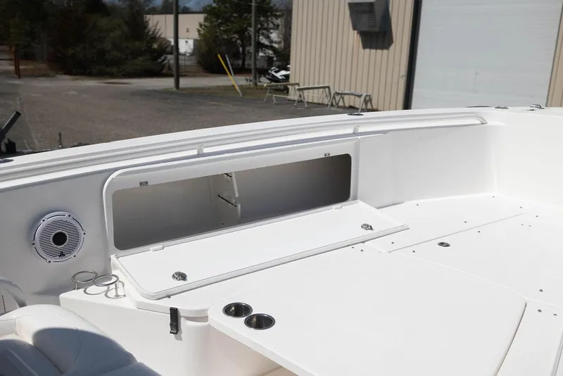 Slide: The Image of 2015 Everglades 355 Center Console boat interior with open storage compartment. - 19
