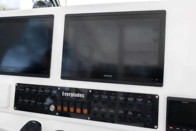 Slide: The Image of Control panel of 2015 Everglades 355 Center Console with Garmin displays. - 8