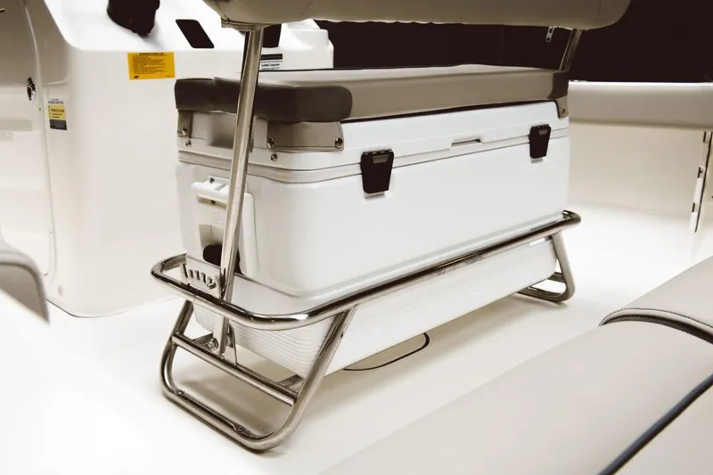 Slide: The Image of 2025 Key West 189 FS boat interior with beige cushioned seating. - 7