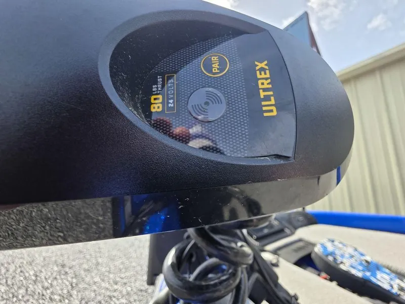Slide: The Image of Close-up of Ultrex motor on 2016 Phoenix 819 Pro boat, showing control panel details. - 18