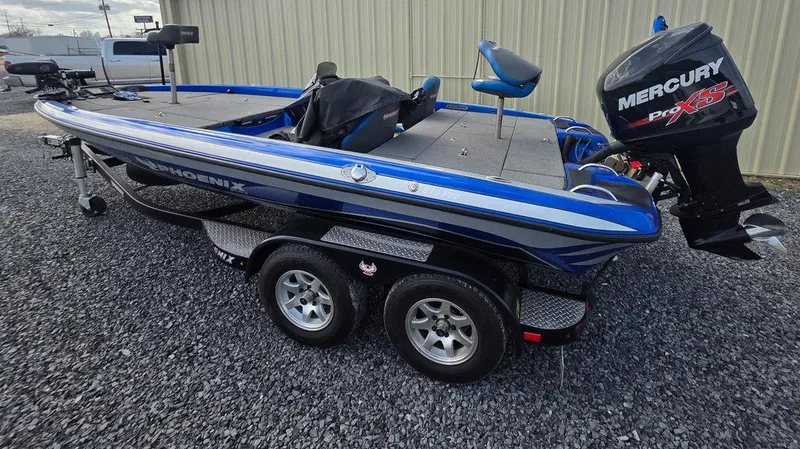 Slide: The Image of 2016 Phoenix 819 Pro boat with Mercury Pro XS engine on a trailer. - 32