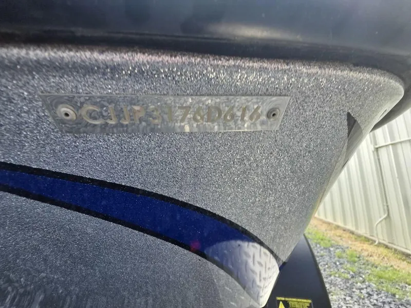 Slide: The Image of 2016 Phoenix 819 Pro boat hull with identification number plate. - 33