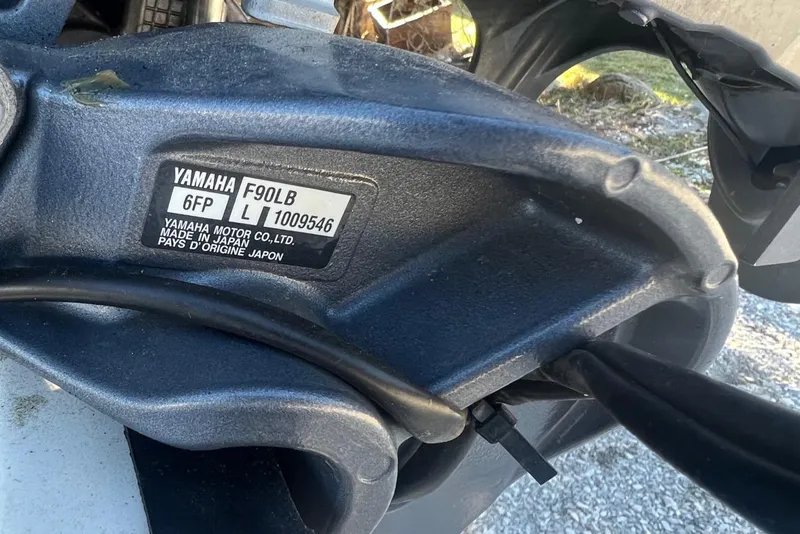 Slide: The Image of Yamaha F90LB engine on 2000 Boston Whaler 17 Montauk boat, close-up view. - 11