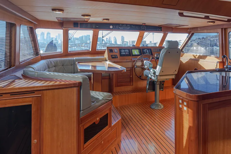Slide: The Image of Luxurious 2003 Marlow 72C yacht interior with wood finish and panoramic windows. - 33
