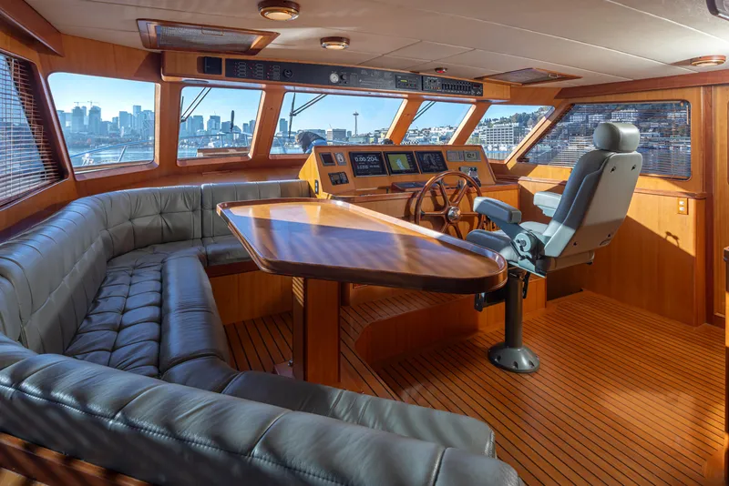 Slide: The Image of Luxurious Marlow 72C yacht interior with leather seating and panoramic city views, 2003 model. - 36