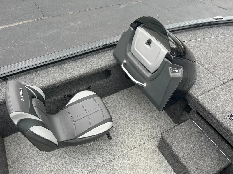 Slide: The Image of 2019 Lund 1875 Pro-V Bass XS boat interior with seat and console. - 19