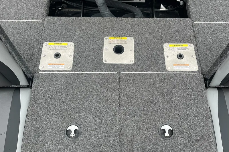 Slide: The Image of 2019 Lund 1875 Pro-V Bass XS boat deck with storage compartments and seat mounts. - 20