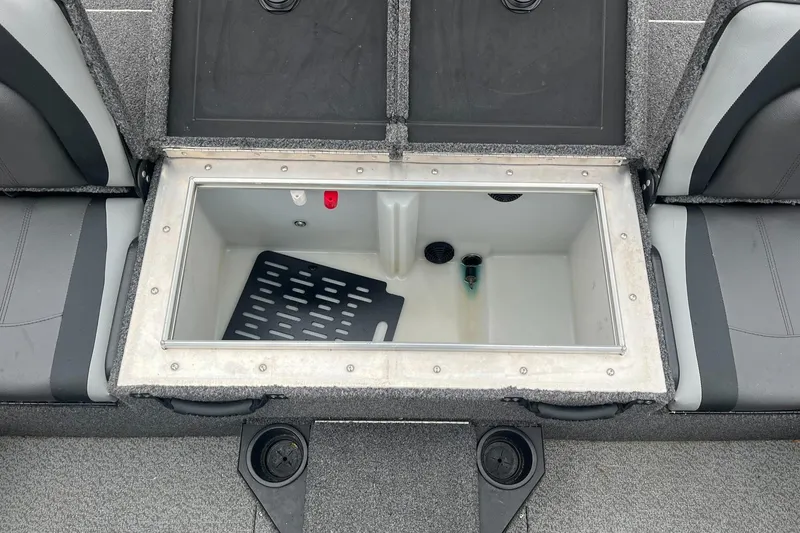Slide: The Image of 2019 Lund 1875 Pro-V Bass XS boat storage compartment with cup holders and seating. - 21