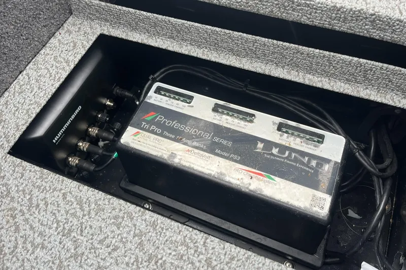 Slide: The Image of 2019 Lund 1875 Pro-V Bass XS battery compartment with Professional Series battery installed. - 26