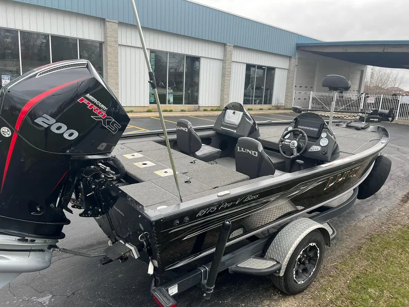 Slide: The Image of 2019 Lund 1875 Pro-V Bass XS boat with 200 HP engine on trailer. - 4