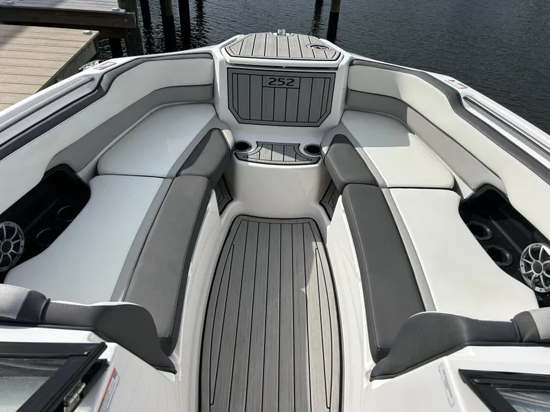 Slide: The Image of 2023 Yamaha Boats 252SD interior with sleek seating and modern design. - 15