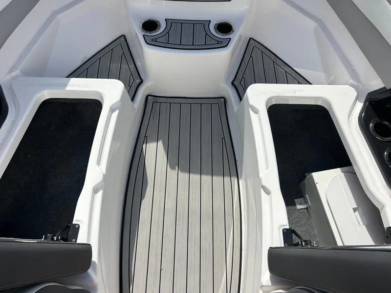 Slide: The Image of 2023 Yamaha Boats 252SD interior with sleek seating and modern design. - 17