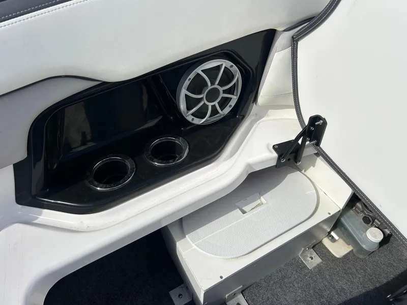 Slide: The Image of 2023 Yamaha Boats 252SD interior with speaker and cup holders. - 19