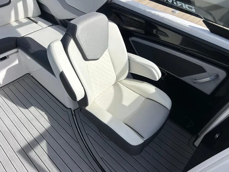 Slide: The Image of 2023 Yamaha Boats 252SD interior with sleek, modern seating and stylish design. - 24