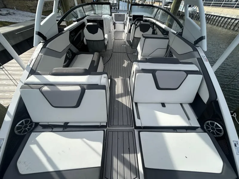 Slide: The Image of 2023 Yamaha Boats 252SD interior with spacious seating and modern design. - 36