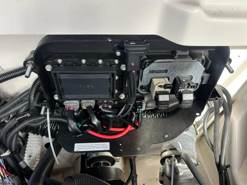 Slide: The Image of 2023 Yamaha Boats 252SD engine compartment wiring and components. - 42