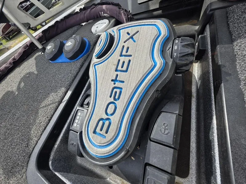 Slide: The Image of Foot pedal on 2021 Caymas CX 21 boat with BoaterFX branding. - 15