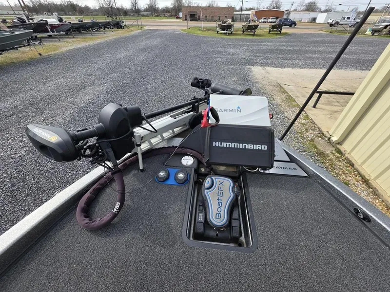 Slide: The Image of 2021 Caymas CX 21 boat with Garmin and Humminbird electronics on deck. - 45