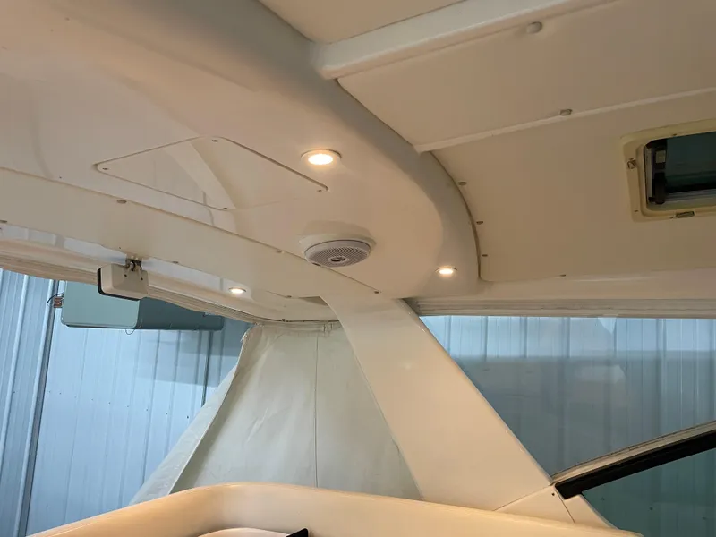 Slide: The Image of Interior view of 2002 Tiara Yachts 3500 Open, featuring ceiling lights and speaker. - 15