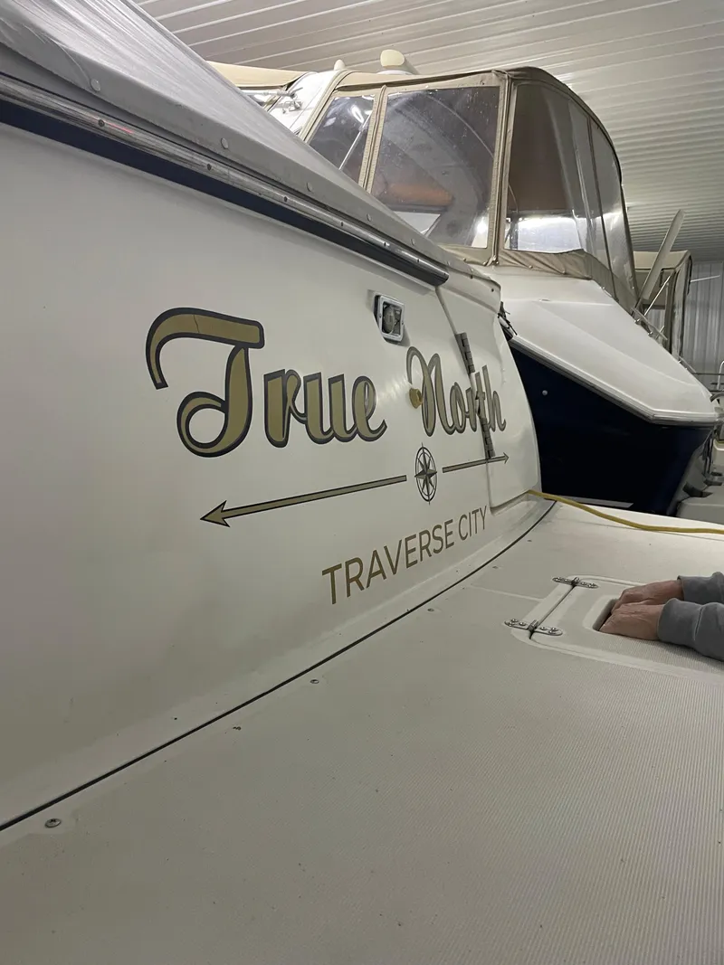 Slide: The Image of 2002 Tiara Yachts 3500 Open named "True North" in Traverse City storage. - 2
