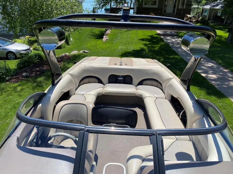 Slide: The Image of 2007 Malibu Wakesetter 23 LSV interior with beige seating and wakeboard tower. - 6