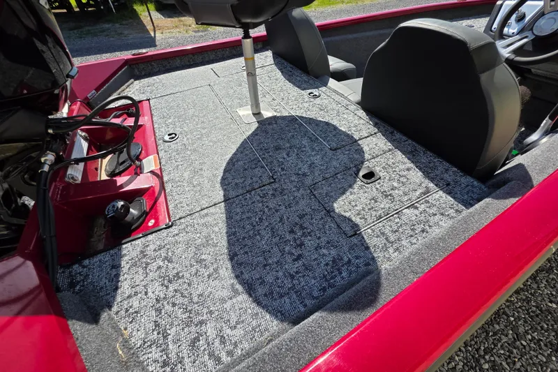 Slide: The Image of 2025 Tracker Pro Team 175 TXW Tournament Edition boat interior with carpeted deck and seating. - 10