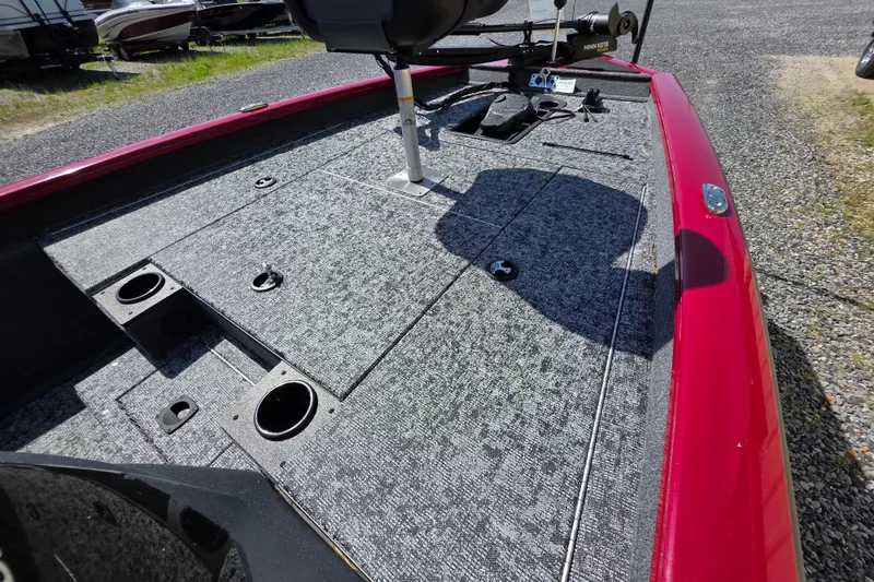 Slide: The Image of 2025 Tracker Pro Team 175 TXW Tournament Edition boat deck with fishing rod holders. - 14