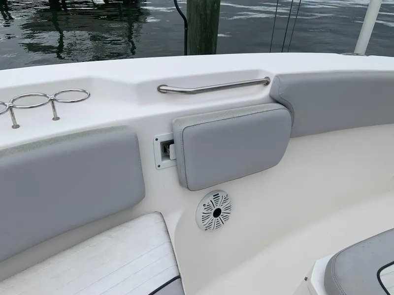 Slide: The Image of 2019 Sea Fox 266 Commander boat interior with cushioned seating and speaker. - 10