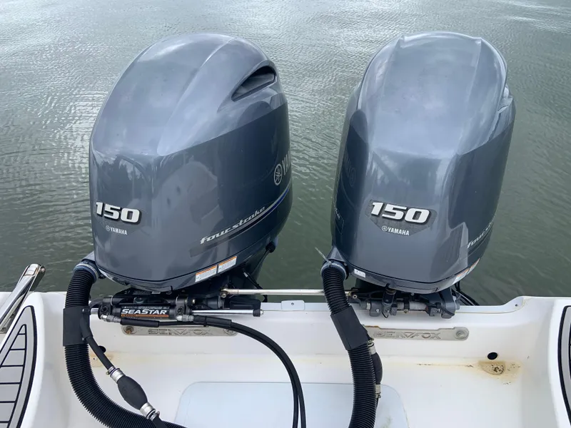 Slide: The Image of Twin Yamaha 150 outboard engines on a 2019 Sea Fox 266 Commander boat. - 18