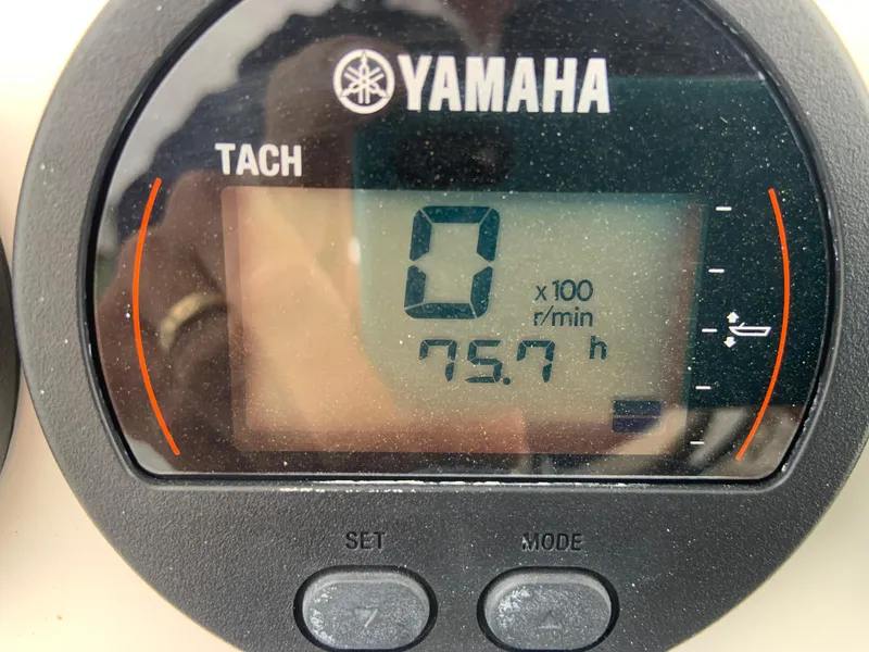 Slide: The Image of Yamaha tachometer displaying 75.7 hours on a 2019 Sea Fox 266 Commander boat. - 3